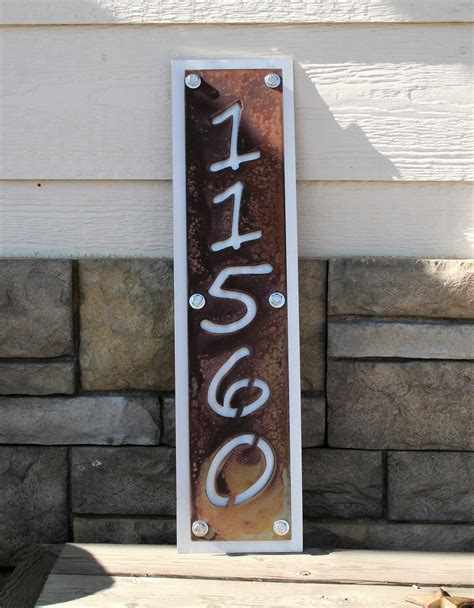 Metal House Number Signs On Pole 